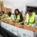 موظفو شركة HDP يشاركون في تعبئة كراتين الخير الغذائية
